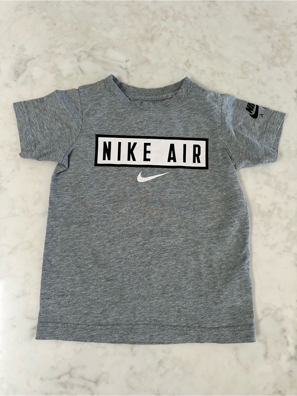 Nike Grey Kids' Short Sleeve 'NIKE AIR' Graphic Tee. Size 5